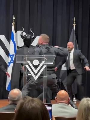 Heckler tries fighting Messiah Vrilya Jarac during rally!!! 🤯  @Vrilya Jarac